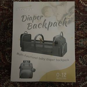 Diaper bag backpack with changing station